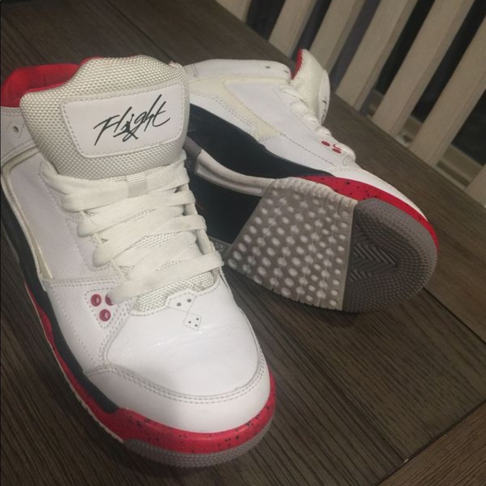 Black,red, and white Jordan’s